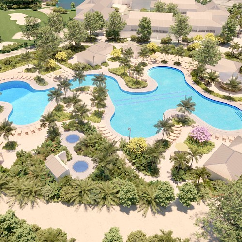 Aerial view of a resort-style swimming pool with surrounding sun loungers, cabanas, and landscaped greenery, providing a tropical vibe.
