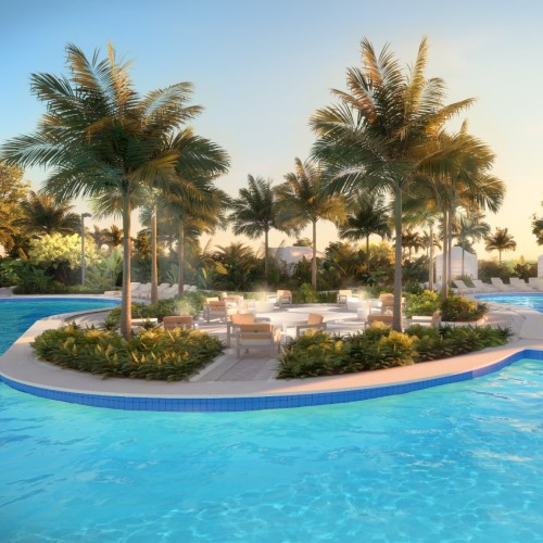 A tropical pool with palm trees, seating area on an island, and cabanas in the background under soft lighting.