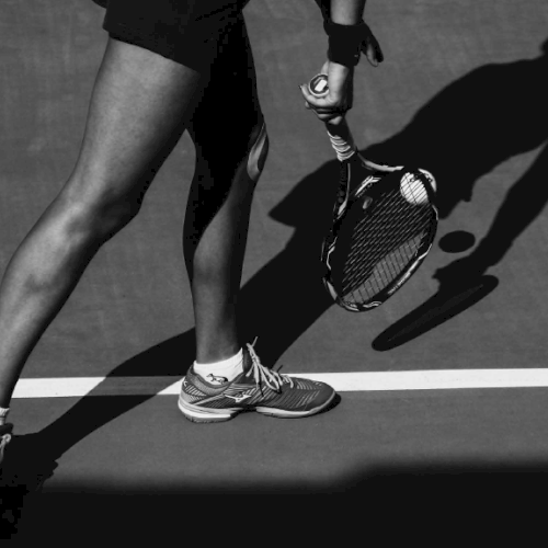 black and white tennis serve