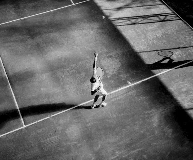 Black and white tennis serve